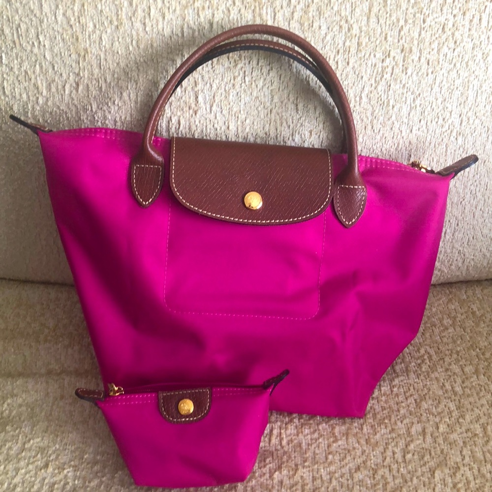 Brand new, never been used Longchamp handbag and change purse!